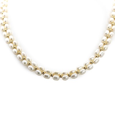 Lot 186 - A cultured freshwater pearl and gold bead necklace