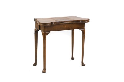 Lot 459 - A French inlaid walnut fold-over card table