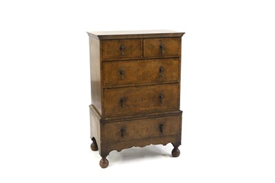 Lot 458 - A old reproduction Queen Anne style walnut chest on stand