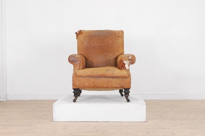 Lot 154 - A distressed leather club chair