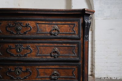 Lot 48 - A walnut commode