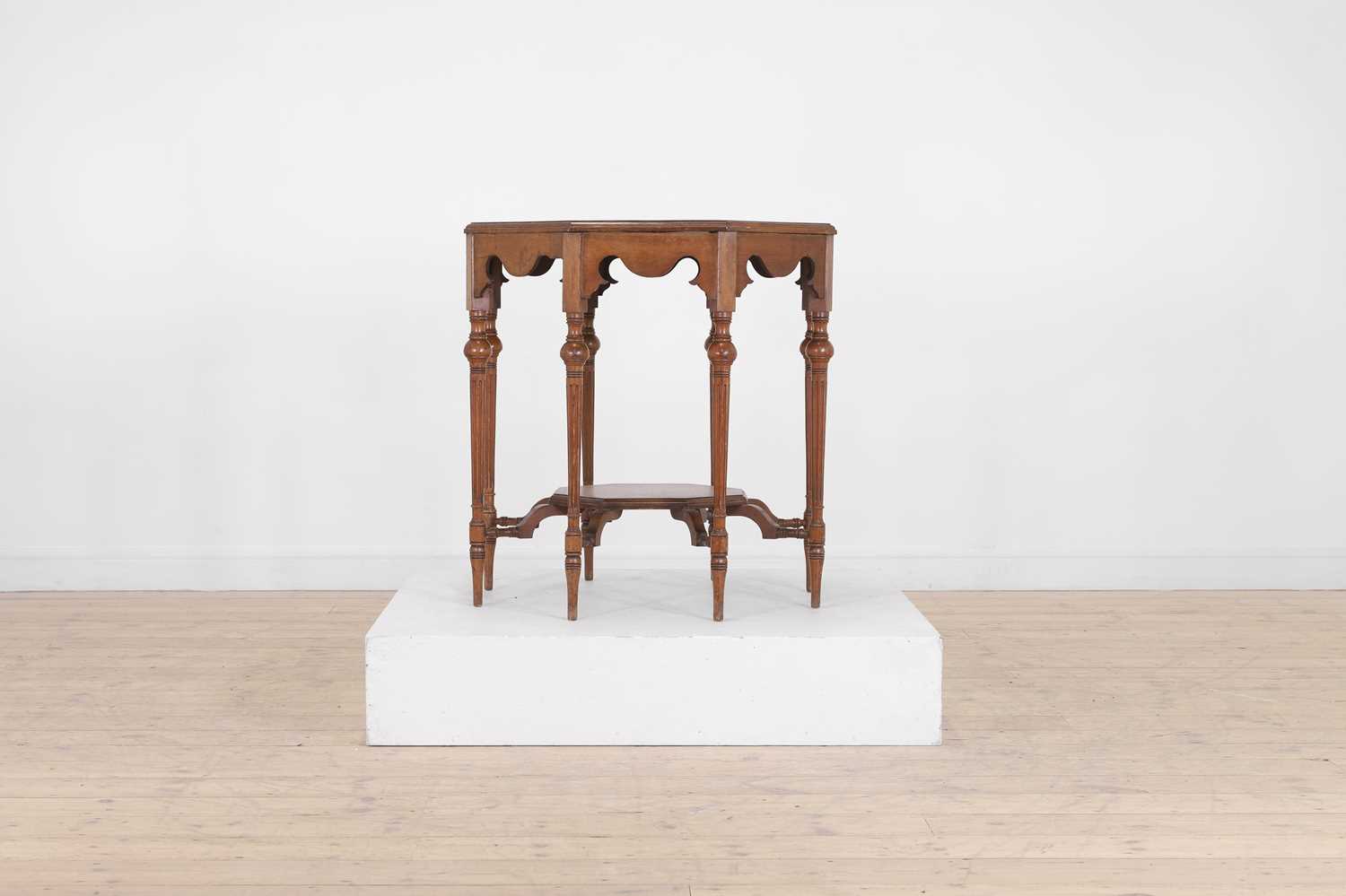 Lot 17 - A walnut centre table