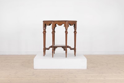 Lot 17 - A walnut centre table