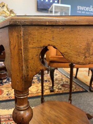 Lot 17 - A walnut centre table