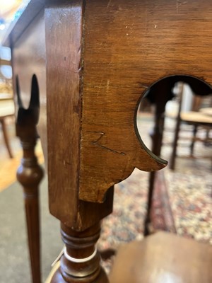 Lot 17 - A walnut centre table