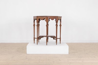 Lot 17 - A walnut centre table