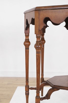Lot 17 - A walnut centre table