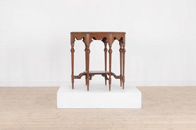 Lot 17 - A walnut centre table