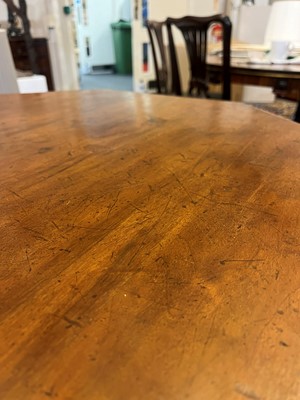 Lot 17 - A walnut centre table