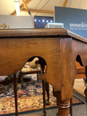 Lot 17 - A walnut centre table