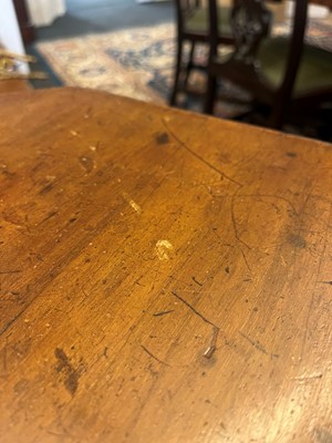 Lot 17 - A walnut centre table