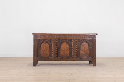 Lot 416 - An inlaid oak chest