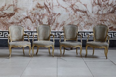 Lot 212 - A matched set of four Louis XV giltwood fauteuils