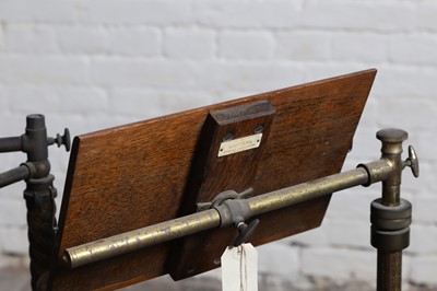 Lot 175 - A Victorian cast iron, brass and mahogany patented reading stand