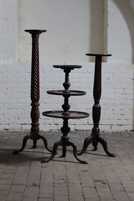 Lot 120 - Two George III-style mahogany torchères