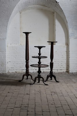 Lot 120 - Two George III-style mahogany torchères