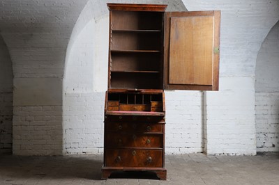 Lot 177 - A narrow walnut bureau bookcase