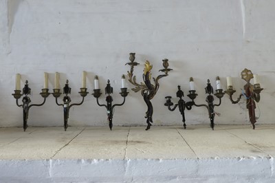 Lot 183 - A set of four twin-branch neoclassical wall lights