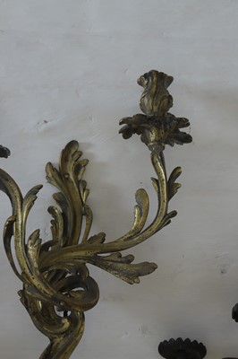 Lot 183 - A set of four twin-branch neoclassical wall lights