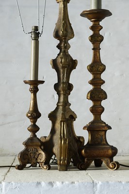 Lot 185 - Three carved giltwood torchère table lamps