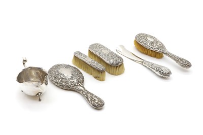 Lot 35 - A silver mounted dressing table set