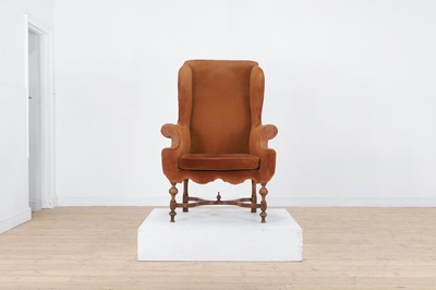 Lot 428 - A William and Mary-style walnut wing-back armchair