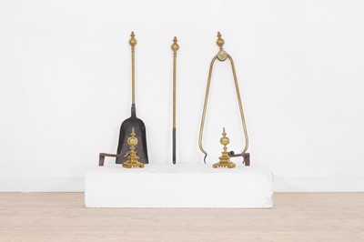 Lot 409 - A set of large Victorian brass fire tools