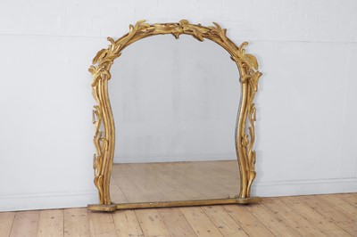 Lot 181 - A carved giltwood overmantel mirror