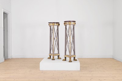 Lot 167 - A pair of Regency-style painted and parcel-gilt wooden jardinière stands