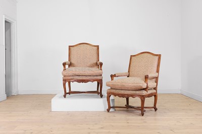 Lot 165 - A pair of Louis XV-style carved beech fauteuils
