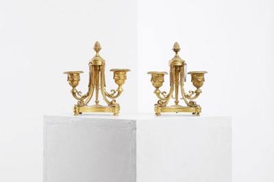 Lot 166 - A pair of ormolu candlesticks