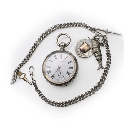 Lot 526 - A silver key wind open faced pocket watch and an Albert chain