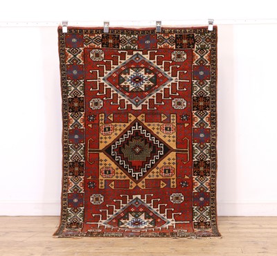 Lot 420 - A tribal wool rug