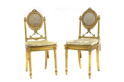 Lot 533 - A pair of Louis XVI-style giltwood side chairs