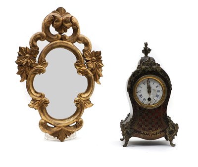 Lot 209 - A tortoiseshell and gilt metal boullework mantel clock