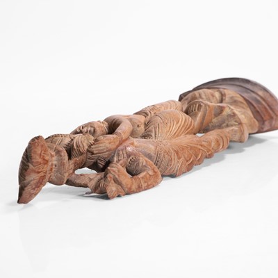 Lot 23 - A carved teak figural group