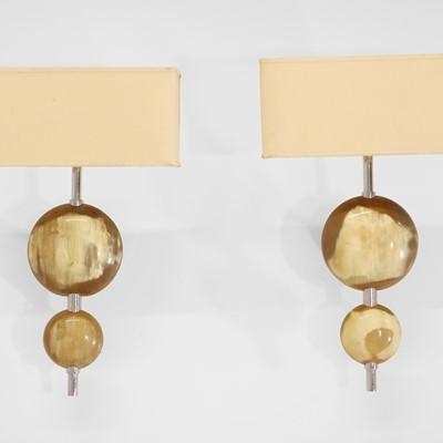 Lot 62 - A pair of horn and chrome wall lights