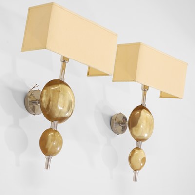 Lot 62 - A pair of horn and chrome wall lights