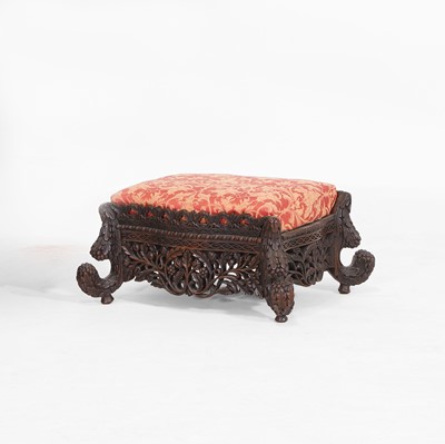 Lot 413 - A carved teak footstool