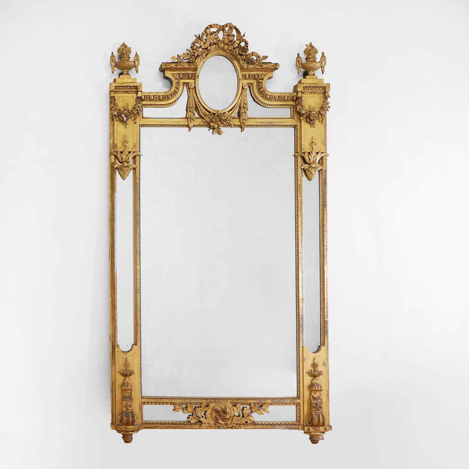 Lot 1 - A Louis XVI-style gilt wall mirror
