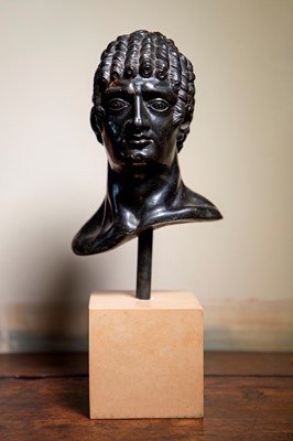 Lot 49 - A grand tour black marble bust of a man
