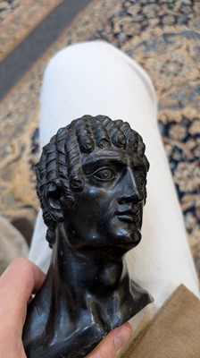 Lot 49 - A grand tour black marble bust of a man