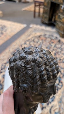 Lot 49 - A grand tour black marble bust of a man