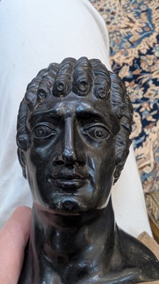 Lot 49 - A grand tour black marble bust of a man