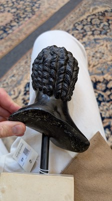 Lot 49 - A grand tour black marble bust of a man