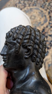 Lot 49 - A grand tour black marble bust of a man