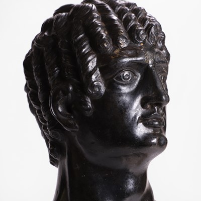 Lot 49 - A grand tour black marble bust of a man