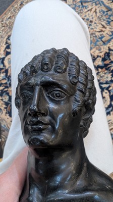 Lot 49 - A grand tour black marble bust of a man