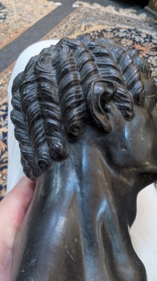 Lot 49 - A grand tour black marble bust of a man