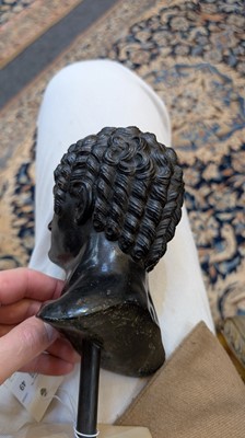 Lot 49 - A grand tour black marble bust of a man